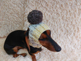 Hat for dog with pompom and holes for the ears
