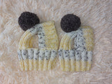 Hat for dog with pompom and holes for the ears