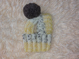 Hat for dog with pompom and holes for the ears