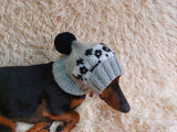 Handmade knitted panda hat for dachshund dog