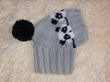 Handmade knitted panda hat for dachshund dog