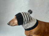 Striped black with gray hat for dog with pompom