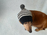 Striped black with gray hat for dog with pompom