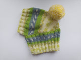 Warm winter hat with pompom for small dog