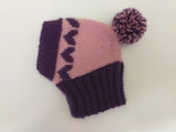Knitted winter hat with hearts for small dog