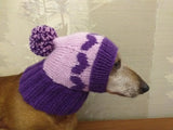 Knitted winter hat with hearts for small dog
