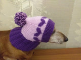 Knitted winter hat with hearts for small dog