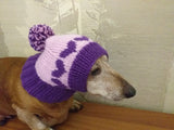 Knitted winter hat with hearts for small dog