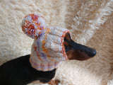 Warm winter snood hat for a dog with a pom-pom dachshundknit
