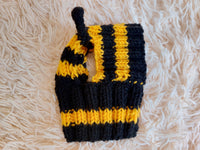 Knitted bee cap for small dog with handmade pompoms