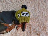 Handmade knitted panda hat for dachshund dog