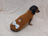 Warm wool sweater for dog with aran patch bear and bow