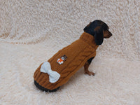 Warm wool sweater for dog with aran patch bear and bow