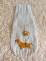 Pet clothes with dachshund and paw, warm handmade knitted sweater for dachshund with paw and dachshund pattern.