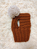 Hat for dog with pompom and holes for the ears