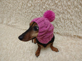 Warm winter snood hat for a dog with a pom-pom