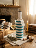 Knitted striped sweater for a bottle of wine