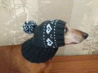 Gray handmade winter knitted hat with hearts for dogs