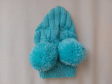 Blue hat with two pom poms for dog dachshundknit