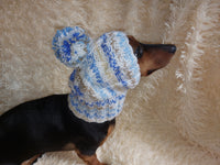 Warm winter snood hat for a dog with a pom-pom dachshundknit